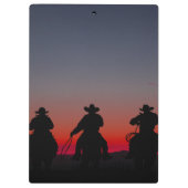 cowboy bij zonsondergang klembord (Achterkant)