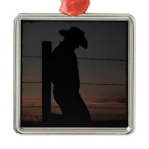 Cowboy bij zonsondergang