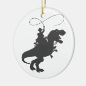 Cowboy die dinosaurus in het prehistorische tijdpe keramisch ornament (Links)