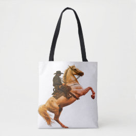 Cowboy die op een schouder op een wit paard rijdt tote bag