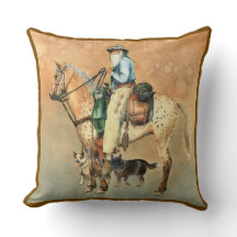 Cowboy en Appaloosa paard met honden