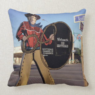 Cowboy figuur bord verwelkomt toeristen in Scottsd Kussen