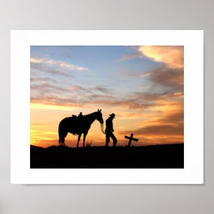 Cowboy gebedsilhouet met zonsondergang Poster