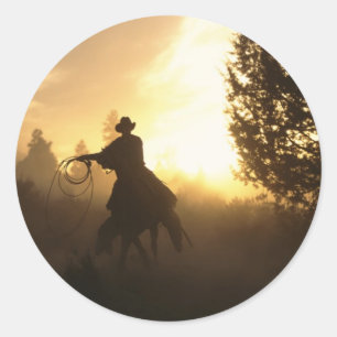 Cowboy met Lasso in Sunset Ronde Sticker