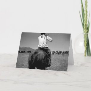 Cowboy op een paard met twee merken kaart