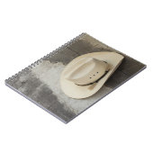 Cowboy-pet aan de wand van de logcabine notitieboek (Linkerzijde)