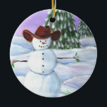 Cowboy Snowman Keramisch Ornament<br><div class="desc">Cowboy Snowman illustreerde afbeelding. Hij draagt een bruin cowboy pet,  zit in sneeuwrollen met pijnbomen en paarse zonsondergang op de achtergrond.</div>