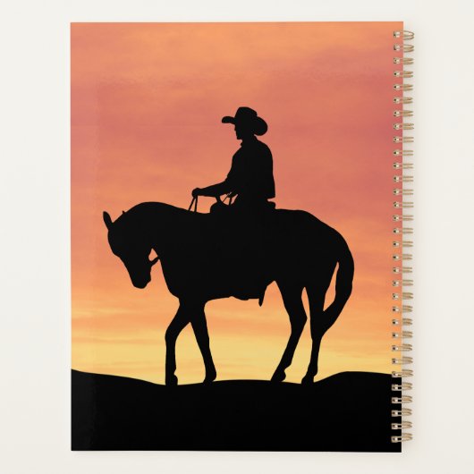 Cowboy te paard bij zonsondergang planner (Achterkant)