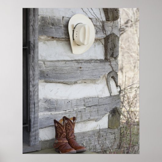 Cowboylaarzen en pet buiten de logcabine poster (Voorkant)