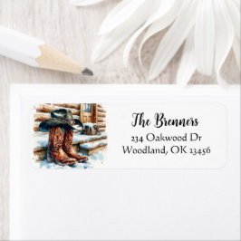 Cowboylaarzen op de veranda op een winterdag etiket