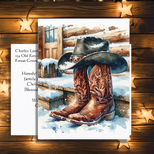 Cowboylaarzen op de veranda op een winterdag feestdagenkaart