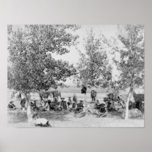 Cowboys eten diner op de grond onder bomen poster