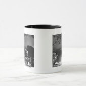 Cowboys spelen en zingen rond een kampvuur mok (Midden)