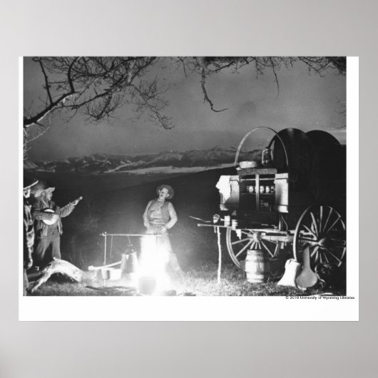 Cowboys spelen en zingen rond een kampvuur poster (Voorkant)