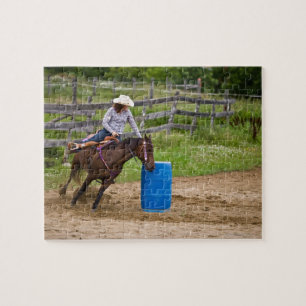 Cowgirl op paardenrennen legpuzzel