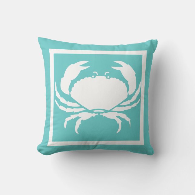 CRAB WHITE op blauwgroen blauwe kussen (Voorkant)