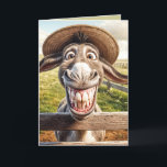 Crazy Birthday Ezel met een Pet Kaart<br><div class="desc">Een ezel met een komische overdreven glimlach staat achter een houten hek,  het dragen van een stro pet voor het ouder worden. Alle tekst is bewerkbaar.</div>