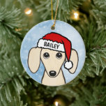 Cream Dachshund Santa Wiener Dog Aangepaste naam Keramisch Ornament<br><div class="desc">Een schattig Engels Cream Dachshund kerst ornament dat kan worden gepersonaliseerd met uw eigen tekst. Voeg naam toe voor een leuk cadeau op maat. Maakt een schatrijk ornament om te laten zien op de kerstboom voor de komende jaren. Bezoek Jenn’s Doodle World voor nog meer vakantiegiften met dit schattige wiener...</div>
