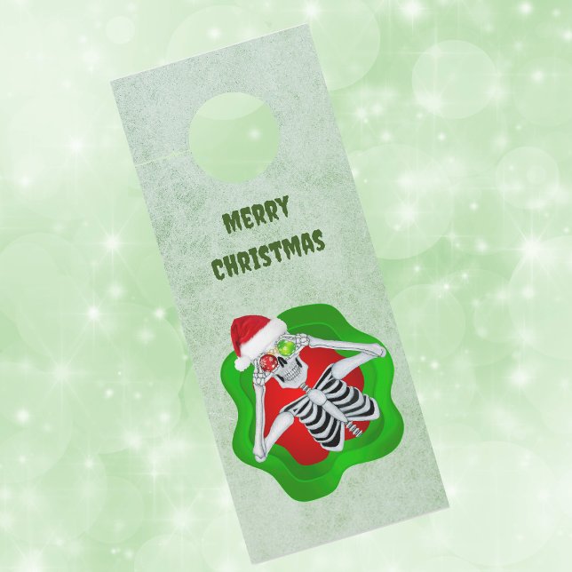 Creepy Christmas Skeleton in Splatter Ornament Eye Deurhanger (Creepy Christmas skeleton ornament eyes in splatter shape on green paper door knob hanger.)
