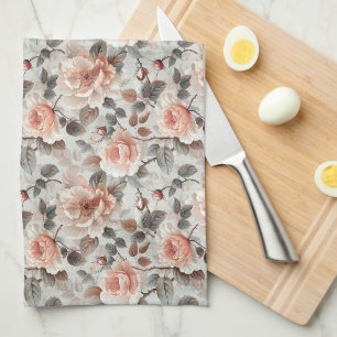 Crème bloemen met grijze bladeren op een lichtgrij theedoek