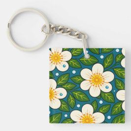 Cremig wit bloemenpatroon met groene bladeren sleutelhanger