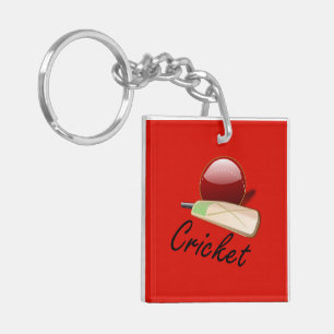 cricketknuppel en -bal, voorzien van een etiket, sleutelhanger