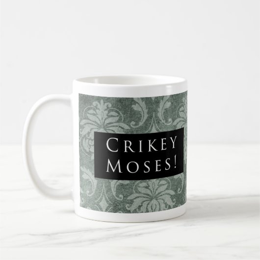 Crikey Moses. Patroon zwart Koffiemok (Links)