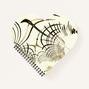 Crossed nut-brown curved sporten, light background notitieboek