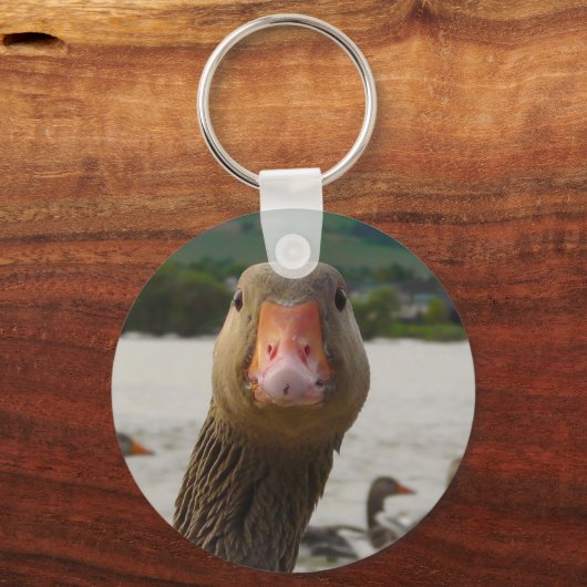 Curieuze Goose Sleutelhanger (Voorkant)