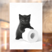 Curious Black Kitten Guarding Toilet Paper Roll On Raamsticker (Vel 2)