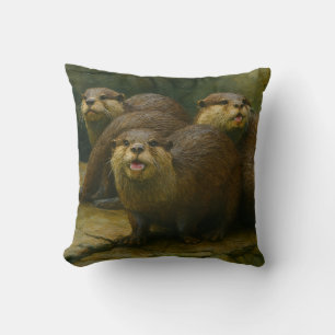 Curious Company – Otter Family On The Rocks beroem Kussen