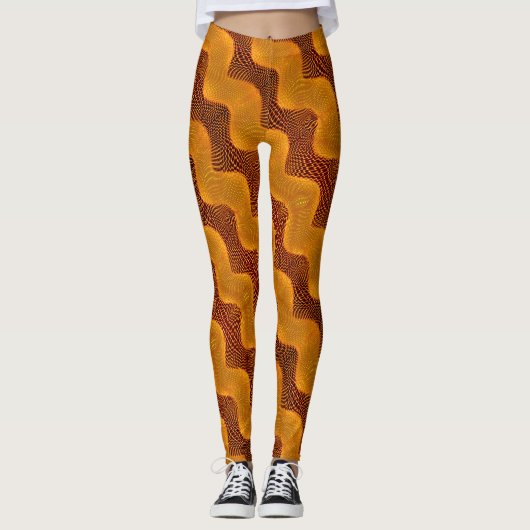 Curva laranja e pontos dourados sobre fundo marrom leggings (Voorkant)