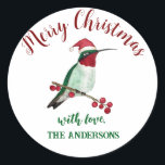 Custom Christmas Hummingbird Ronde Sticker<br><div class="desc">Dit gepersonaliseerde Kerst sticker is voorzien van een met de hand geïllustreerde kolibrie met een kerstmuts. Voeg een uniek tintje toe aan uw geschenken,  brieven of zelfgemaakte goederen.</div>