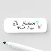 Custom logo name tag for cardiologist (In situ)