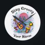 Custom Wall Clock | Retro Octopus | Name & Text Ronde Klok<br><div class="desc">✨ Add groovy retro vibes to your wall with this custom octopus clock!
🖊️ Customize the top phrase add any name for a one-of-a-kind gift.
🕒 Perfect for home decor, offices, dorm rooms, and kids’ spaces.
🎁 Great for birthdays, holidays, and personalized surprises.</div>