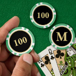 Custom Zwart Goud Monogram 100 Toernooi Spel Poker Chips<br><div class="desc">Creëer uw eigen aangepaste, gepersonaliseerde, 100-denominatie, modern faux gouden monogram op zwarte achtergrond, monogram kerstgroene pokerchips, in 9 levendige kleuren en met een gestructureerd oppervlak voor eenvoudige stapeling. Typ gewoon uw initialen / monogram in, om aan te passen. U kunt zelfs de denominatie van 100 veranderen in een van uw...</div>