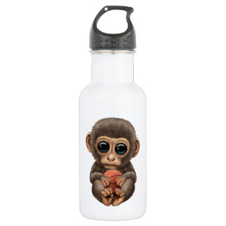 Cute Baby aap spelen met Basketball Waterfles