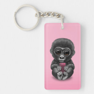 Cute Baby Gorilla die een mobiel telefoonroze vast Sleutelhanger