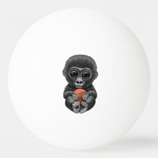 Cute Baby Gorilla die met Basketball speelt Pingpongbal