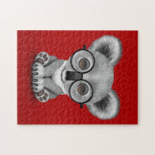 Cute Baby Koala Beer Cub Wearing Glasses on Red Legpuzzel (Horizontaal)
