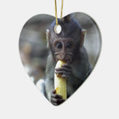 Cute baby macaque aap banana keramisch ornament (Links)