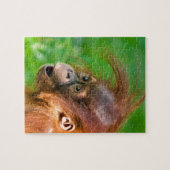 Cute baby orangutan kijkt in verwondering legpuzzel (Horizontaal)