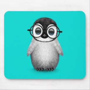 Cute Baby Penguin Wearing Eye Glasses on Blue Muismat