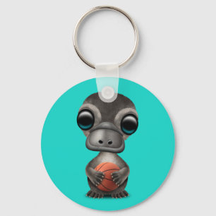 Cute Baby platypus die met Basketball speelt Sleutelhanger