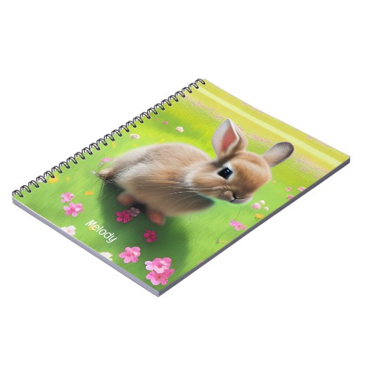 Cute baby rabbit in een bloemwei notitieboek (Linkerzijde)