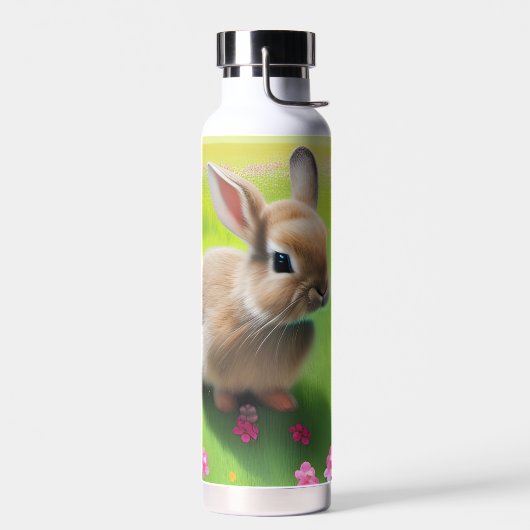 Cute baby rabbit in een bloemwei waterfles (Links)