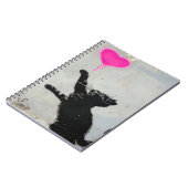 Cute Black Cat Playing with A Pink Heart Notitieboek (Linkerzijde)