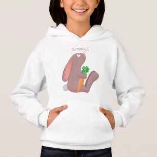 Cute bunny rabbit, zittend met wortelcartoon