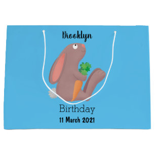 Cute bunny rabbit, zittend met wortelcartoon groot cadeauzakje