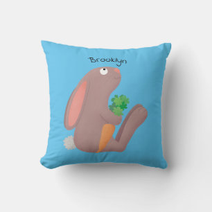 Cute bunny rabbit, zittend met wortelcartoon kussen